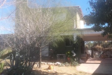 Excelente Casa en Capilla del Monte en Venta · dueño directo · 4 o más dorm · 3 cocheras · 750 m² de lote - Imagen 4