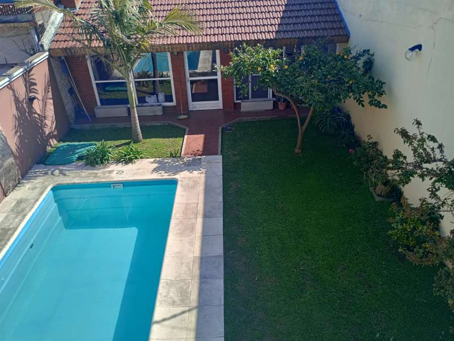 Casa en General San Martin: en Venta · 3 dorm · 4 ambientes · cochera · 230 m² de lote - Imagen 1